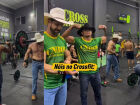 'Crossfiteiros do agro' viralizam ao treinar de chapéu, bota e fivela em MS