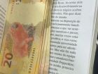 Suspeito é preso com R$ 2 mil em notas falsas dentro de livro em MS 
