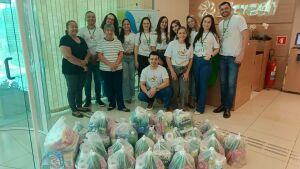 AAVC recebe doações do Sicredi em Coxim no Dia de Cooperar e assinam documento do Projeto Sopro de Vida