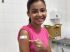 Maria Ligia, 10 anos, foi a primeira criança a receber a vacina em Coxim. Foto: Divulgação AssCom PMC