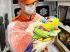 Bombeiro segura bebê enrolado em cobertor dentro da ambulância. Foto: Divulgação/Corpo de Bombeiros