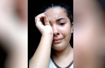 Sofia Ventura chora após água alagar sua casa, em Aparecida de Goiânia 