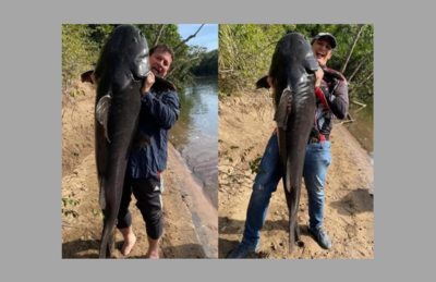 Pai e filho com peixe de 60kg em rio de MS