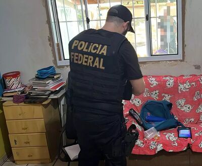 Policial Federal durante cumprimento de mandado em Campo Grande.
