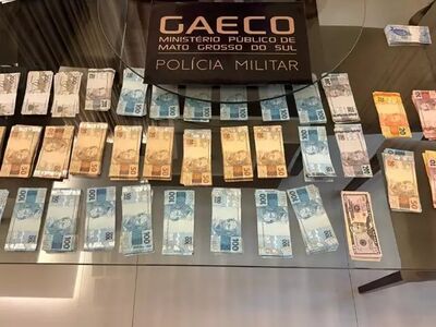 Parte do dinheiro apreendido na casa de investigados na Operação Gutenberg. Foto: Gaeco/Divulgação
